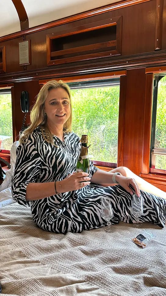 Bernie enjoying our in-room bubbly