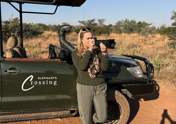 Lady with wildlife came lens at a Private Game Reserve