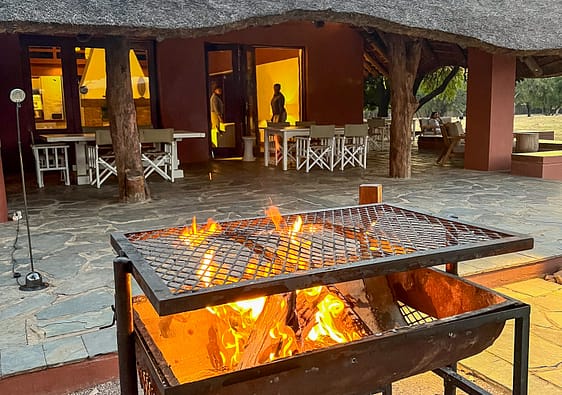 A big fire on a braai in a game lodge in South Africa for Heritage Day