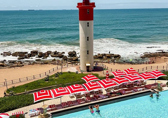Views down to the pool, beach and Lighthouse from the Lighthouse Bar at the Oyster Box Umhlanga, Kwa-Zulu Natal group tour