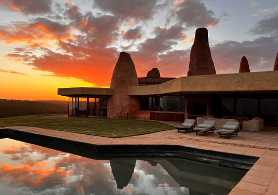 Beautiful architecture of Sandcastle Villa at sunset.