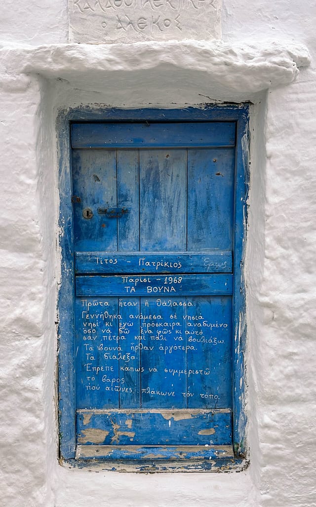 Volax on Tinos, blue door with poem. Geheimtipp in den Kykladen