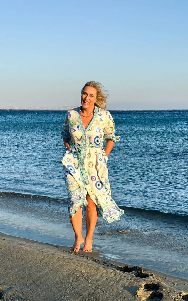 Lady at a beach on Tinos in Greece. Frau am Strand auf Tinos in Griechenland
