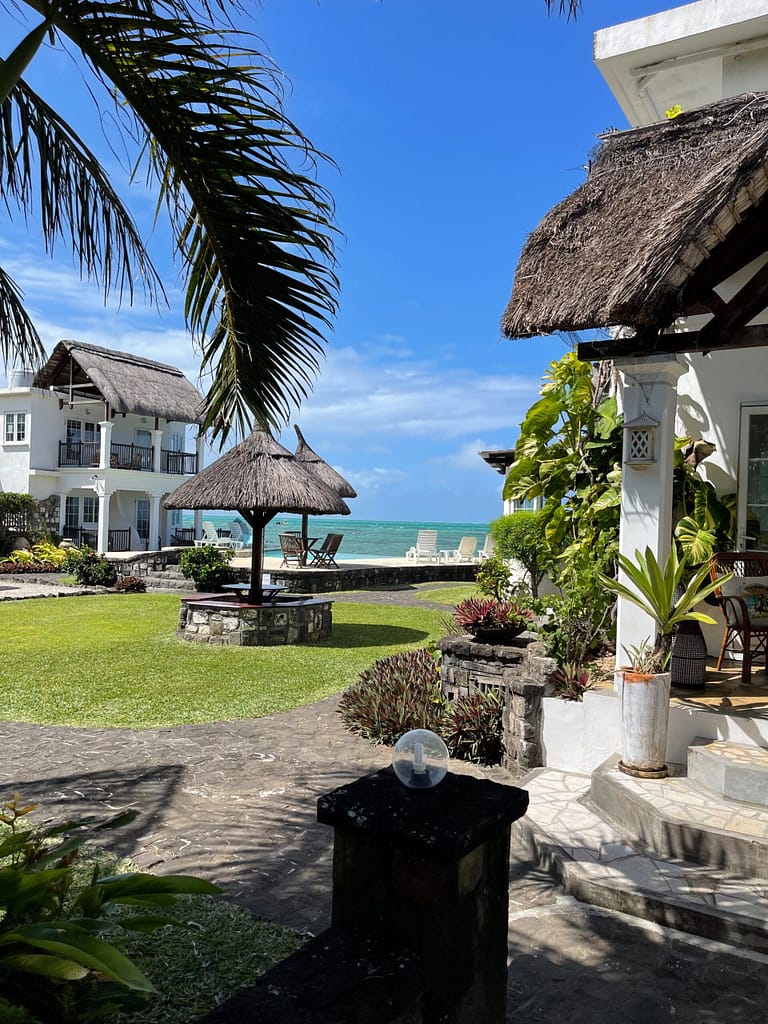 Travelbuddieslifestyle at Chill Pill Guesthouse in Mauritius with ocean views and thatch
