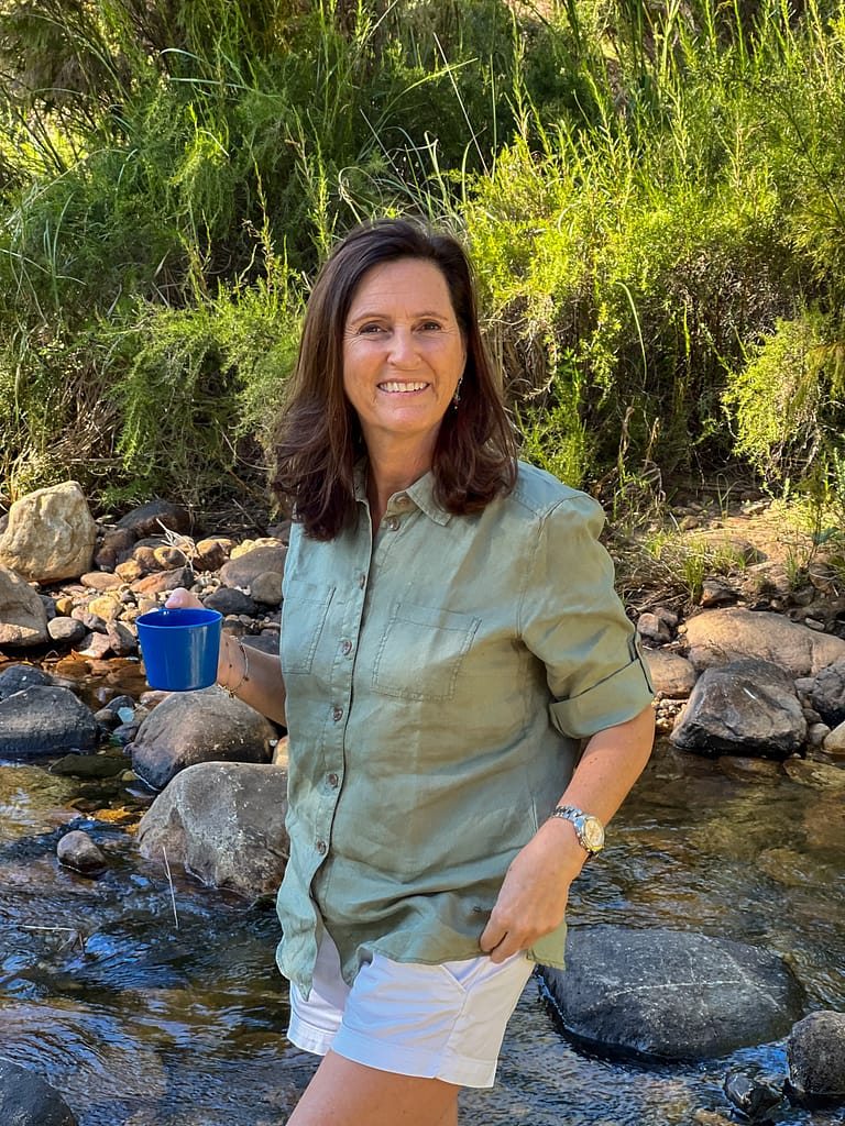 Coffee break in the river lady drinking coffee in nature