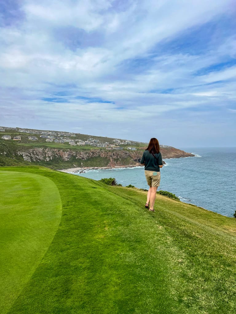 Petra admiring the view at Pinnacle Point Gold Resort in South Africa