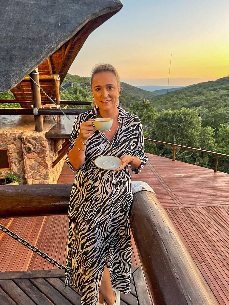 Bernie enjoying her morning coffee before the game drive at Rock Lodge