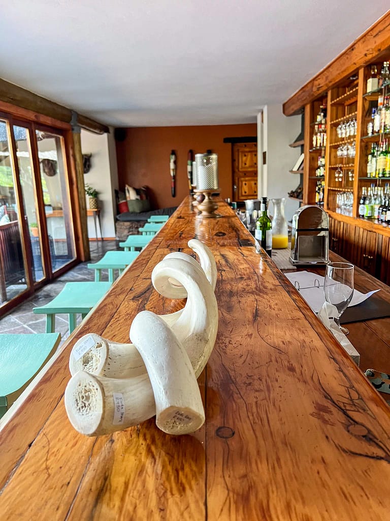 The inviting well-stocked bar at the main building