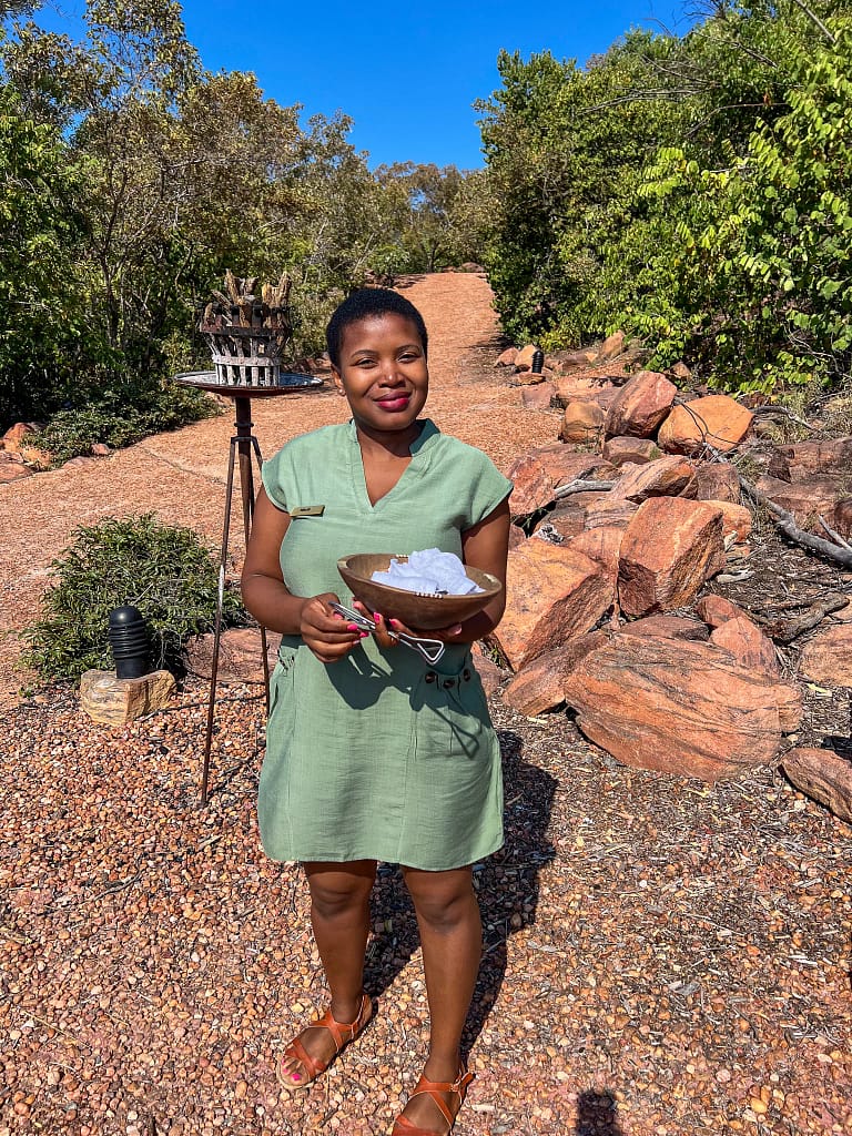 Our very friendly host Nkuli welcoming guest after their game drive with refreshing cloths