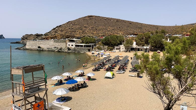 Mikri Kolimbithra Beach, Tios, Greece, Beach with sunbeds