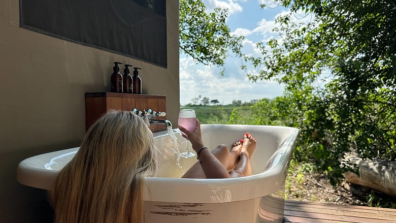 Bernie enjoying our outside bathtub with the stunning views
