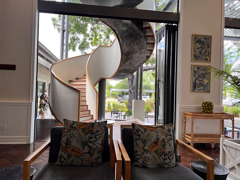 The spiral staircase near the entrance of the Palm River Hotel