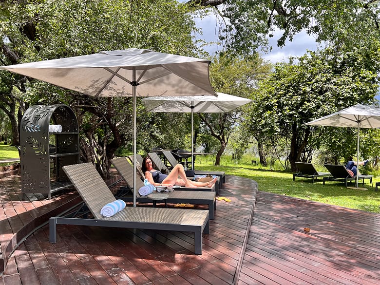 Petra enjoying the sun loungers near the pool