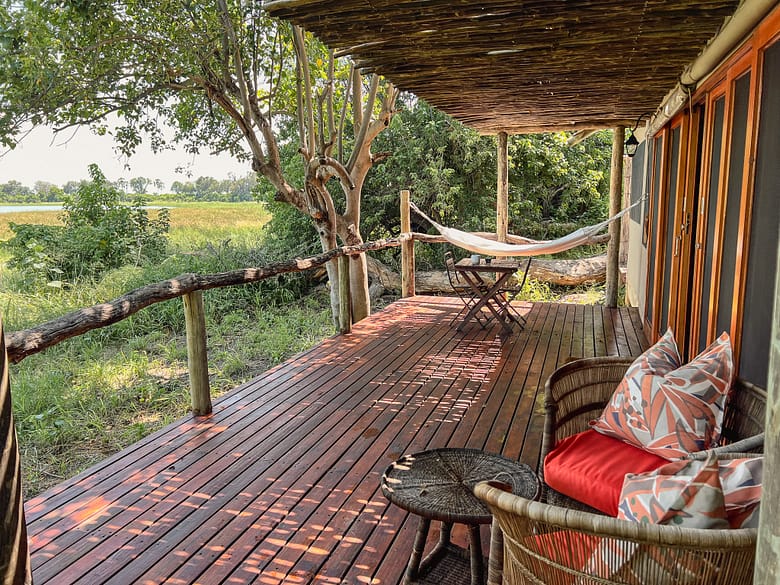 Our tent's patio with relaxing hammock to enjoy lazy afternoons with expansive views over the flood areas