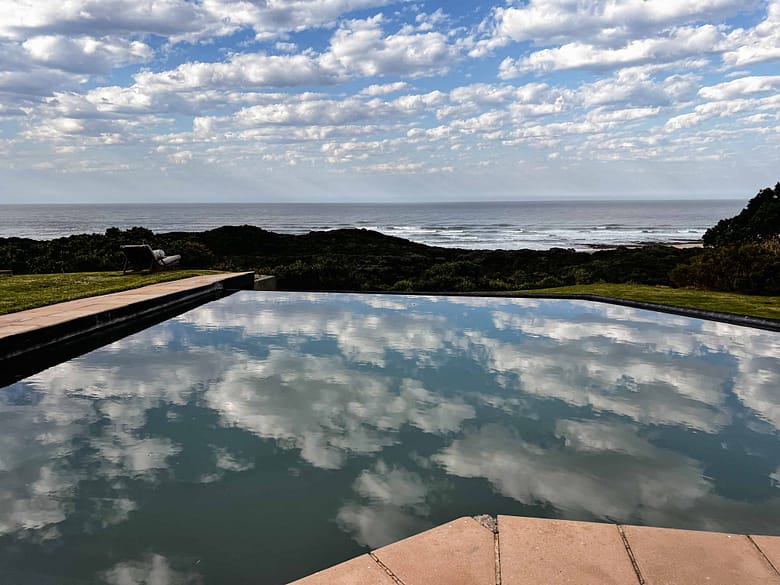 Pool with ocean view at Sandcastle Luxury Villa for eight