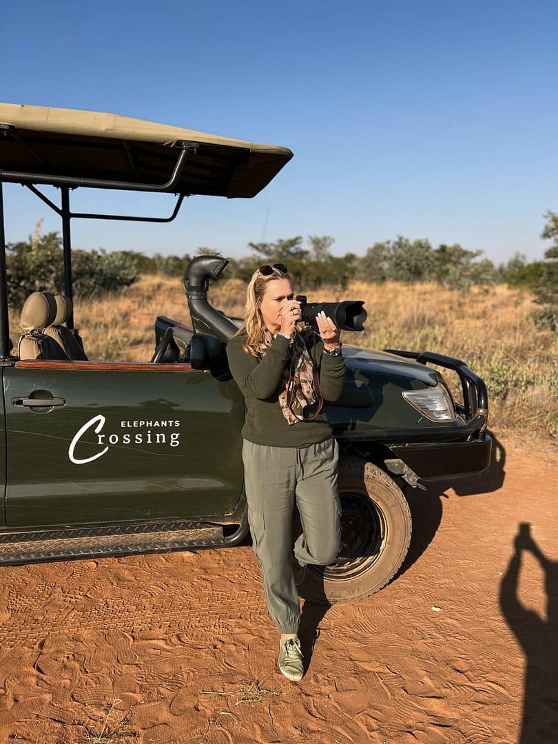 Lady with wildlife came lens at a Private Game Reserve
